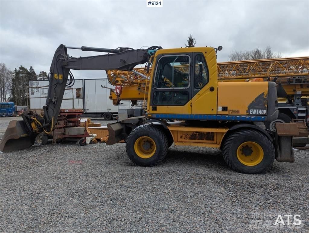 Volvo EW140B  휠 굴삭기