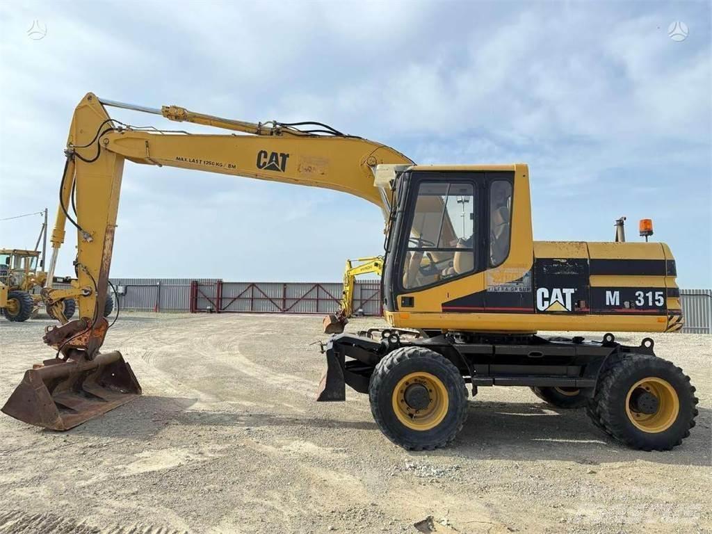 CAT M 315  휠 굴삭기