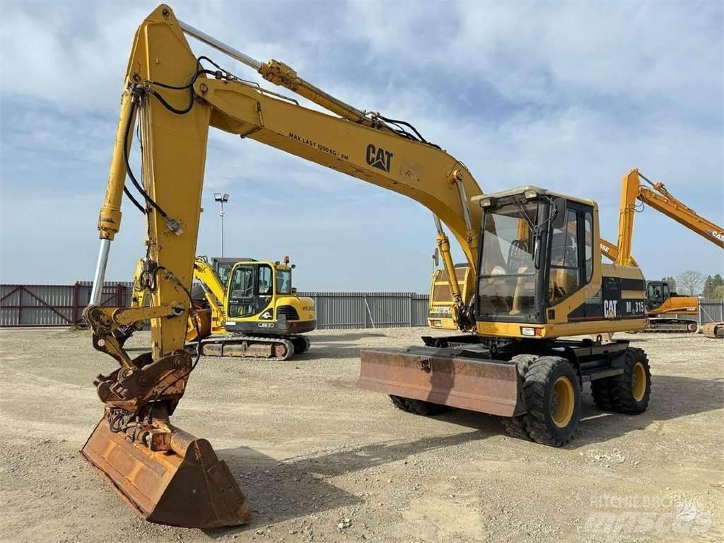 CAT M 315  휠 굴삭기