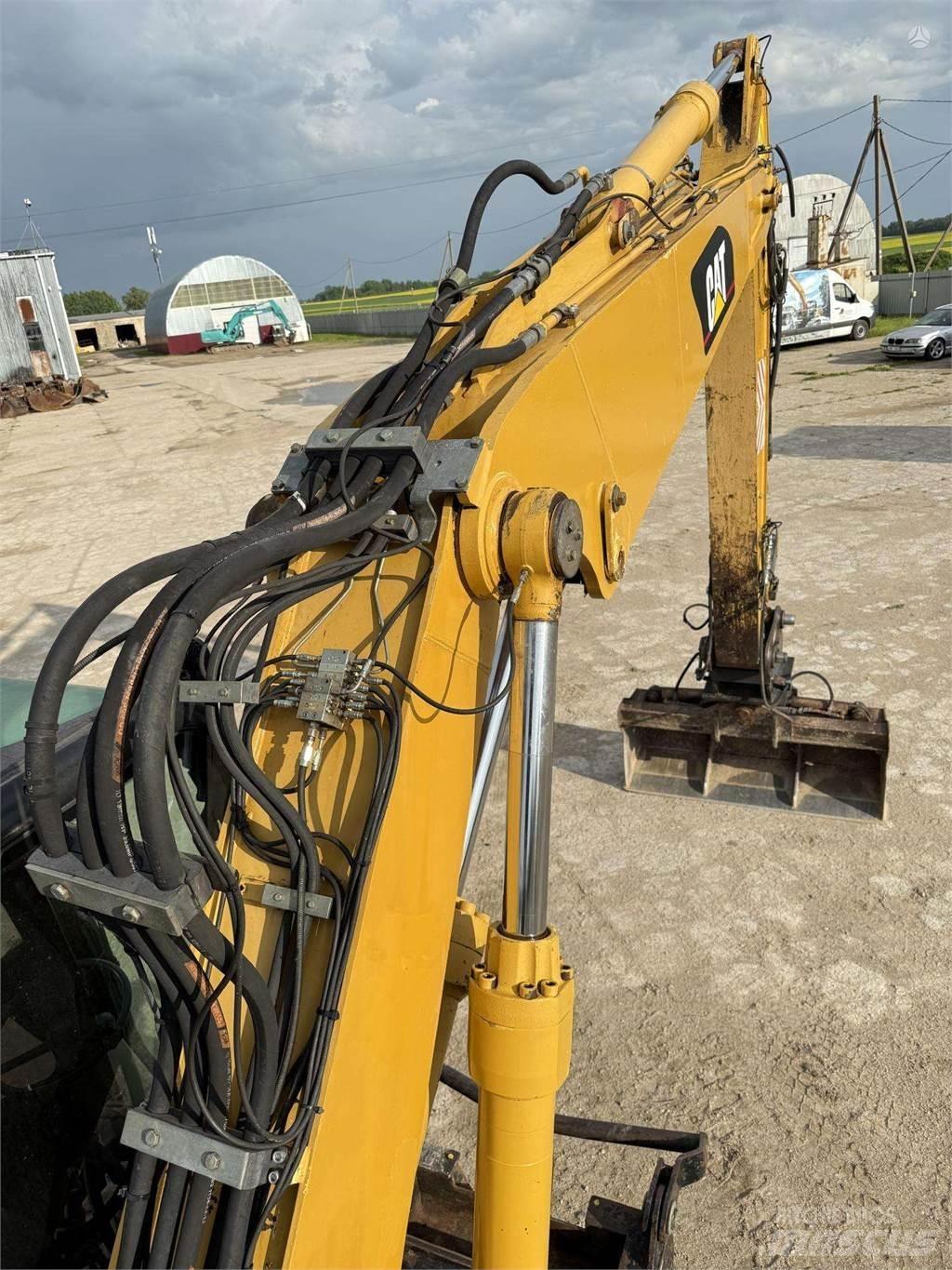 CAT M315C  휠 굴삭기