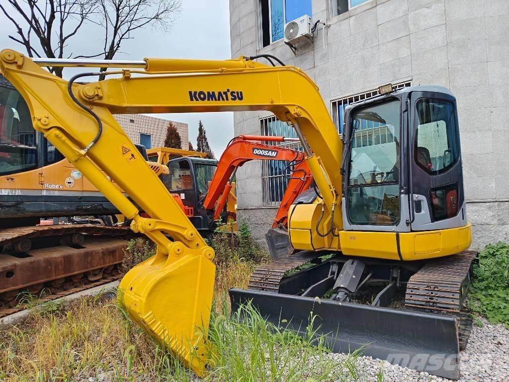 Komatsu PC 78 US 중형굴삭기 7톤-28톤