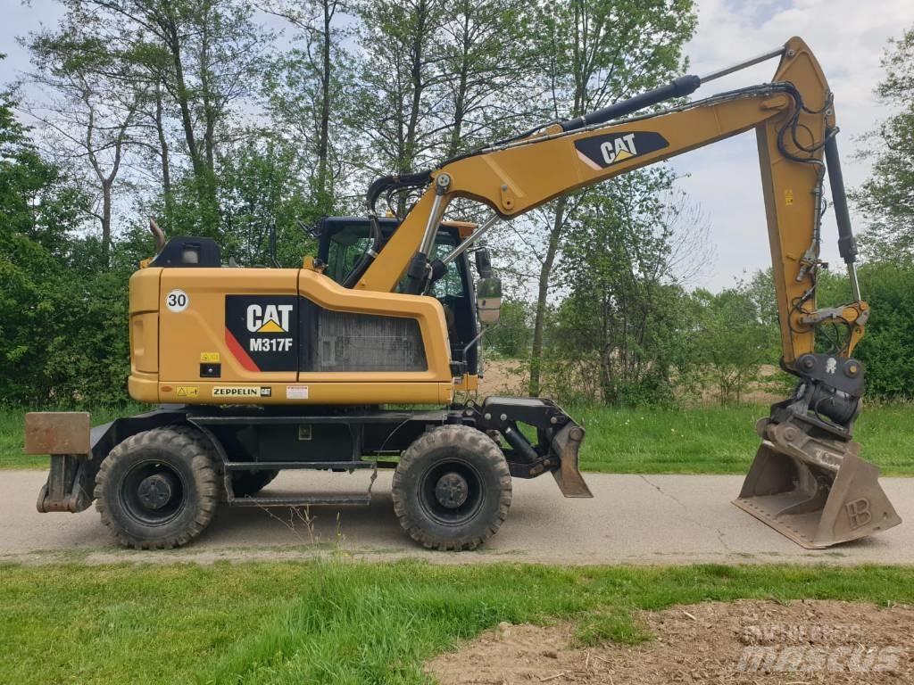 CAT M 317 F  휠 굴삭기