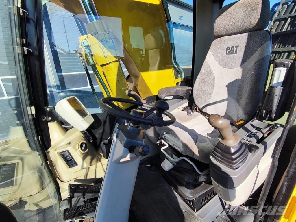 CAT M 318 C  휠 굴삭기