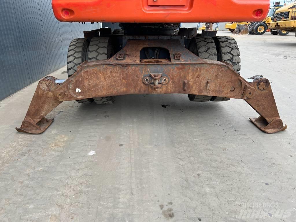Doosan DX210W  휠 굴삭기