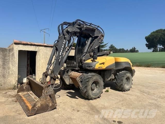 Mecalac 12 MTX  휠 굴삭기