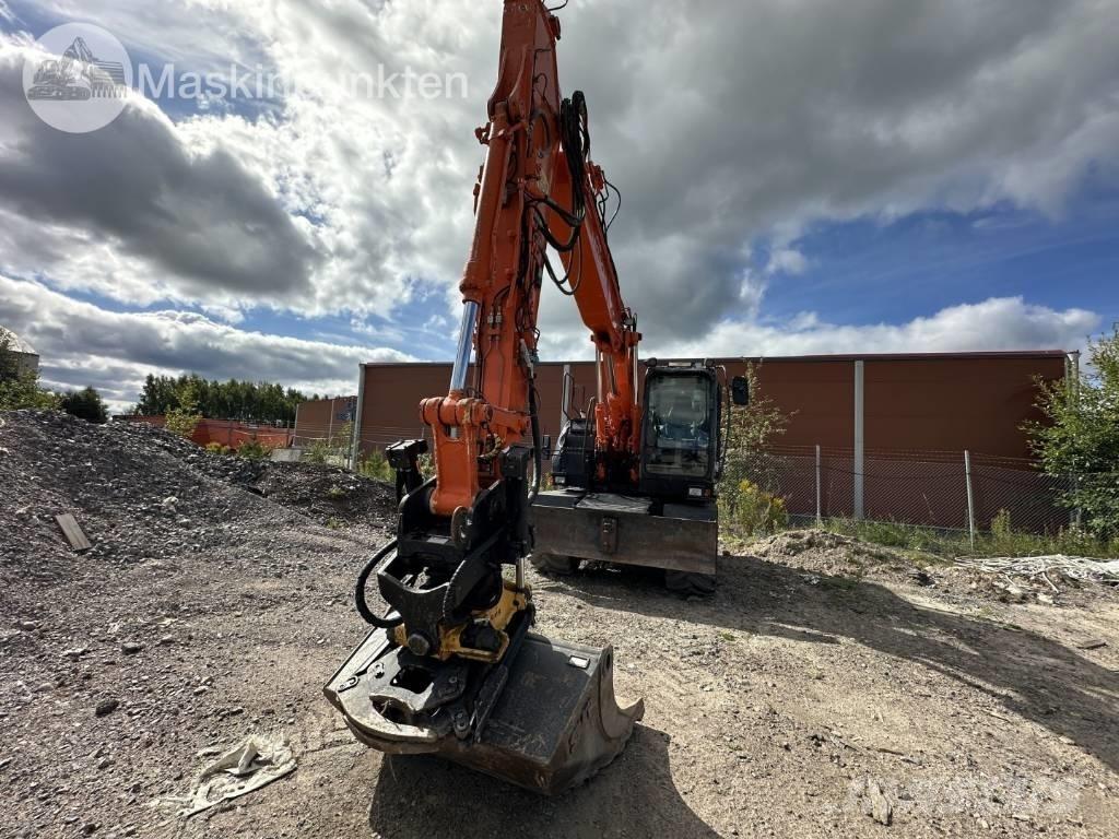 Hitachi ZX 140 W-5B  휠 굴삭기