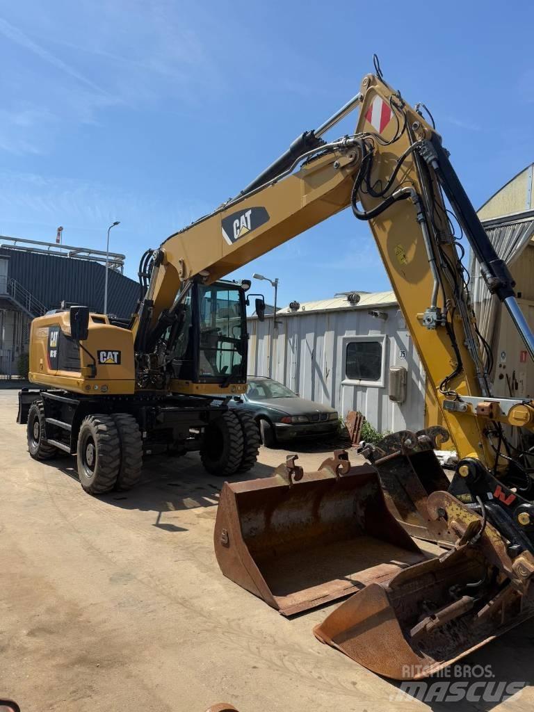 CAT M 318 F  휠 굴삭기