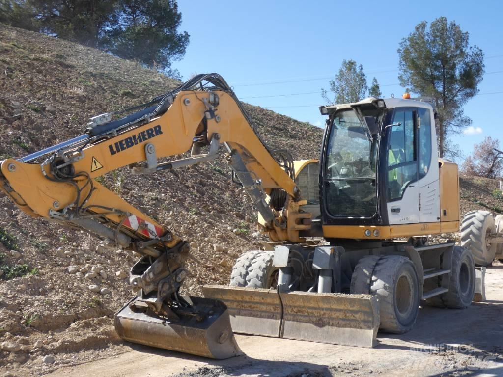 Liebherr A 912  휠 굴삭기