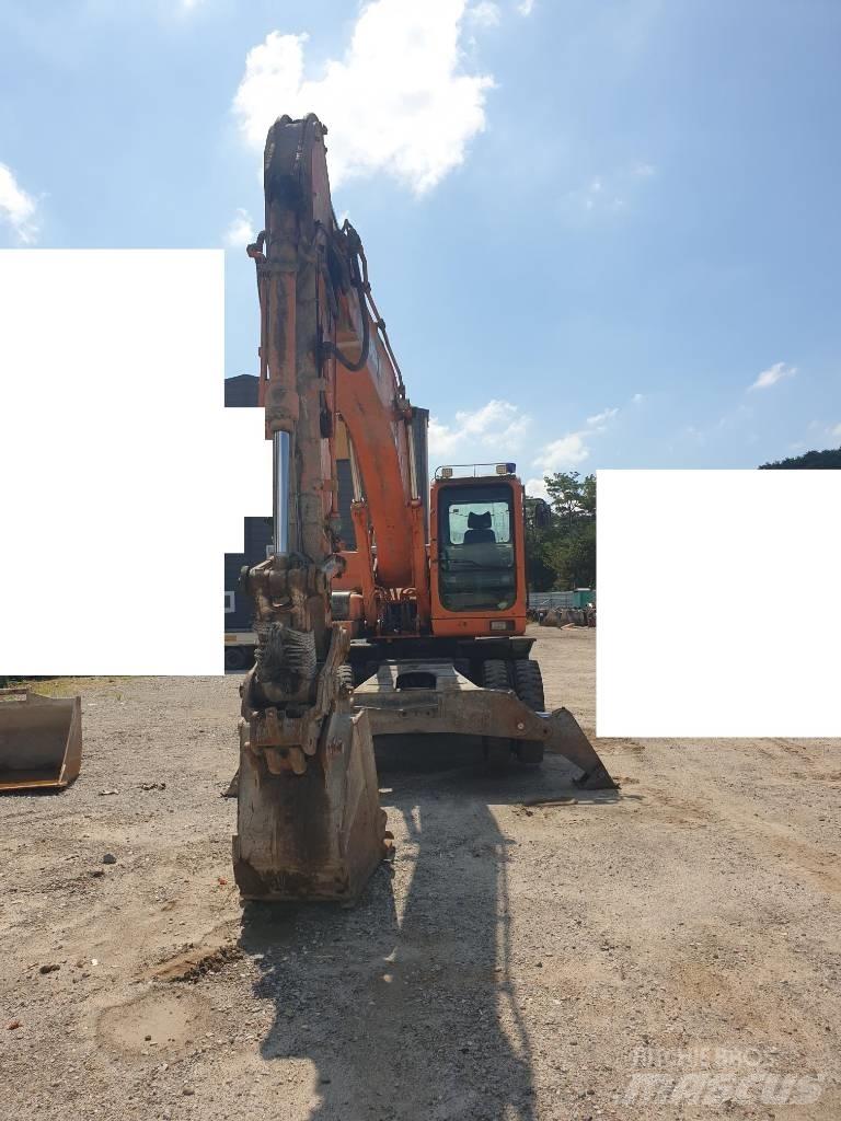 Doosan DX210WA  휠 굴삭기