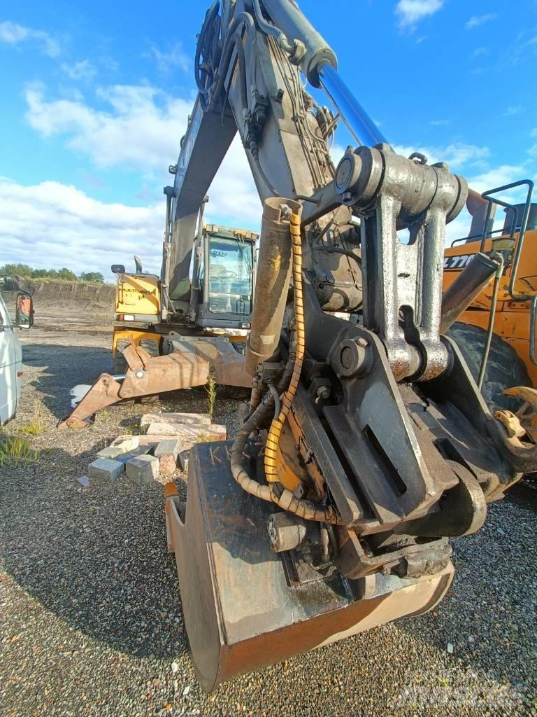 Volvo EW 140  휠 굴삭기