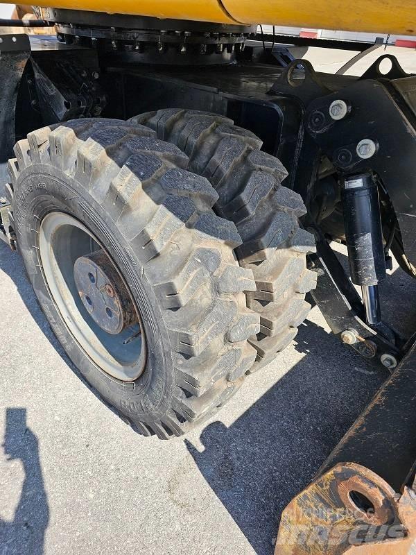 CAT M 318 F  휠 굴삭기