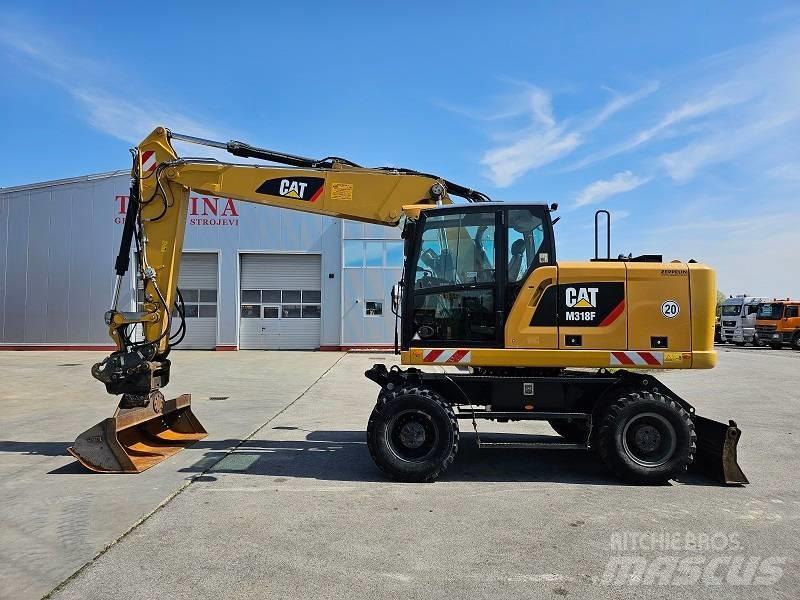 CAT M 318 F  휠 굴삭기