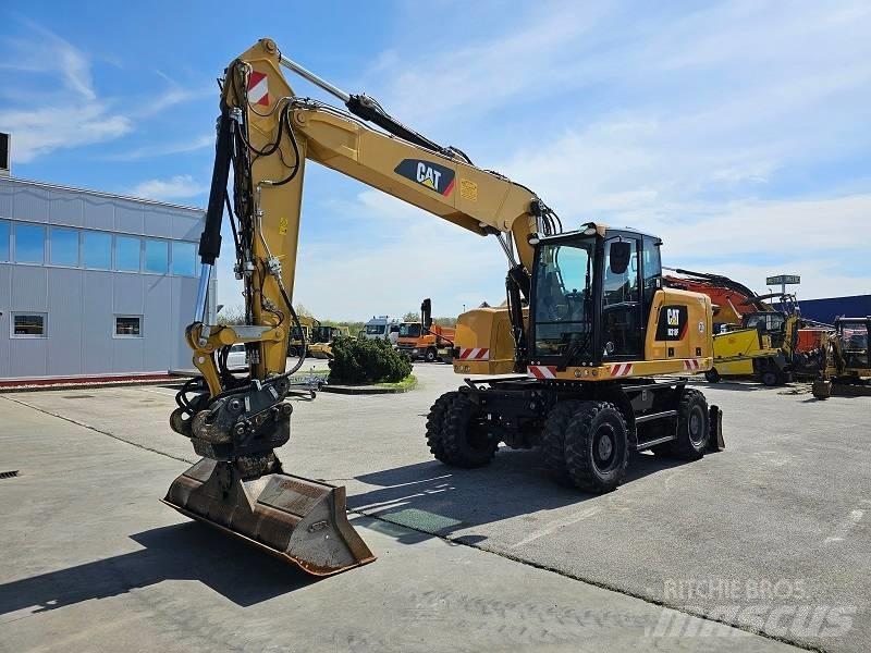 CAT M 318 F  휠 굴삭기