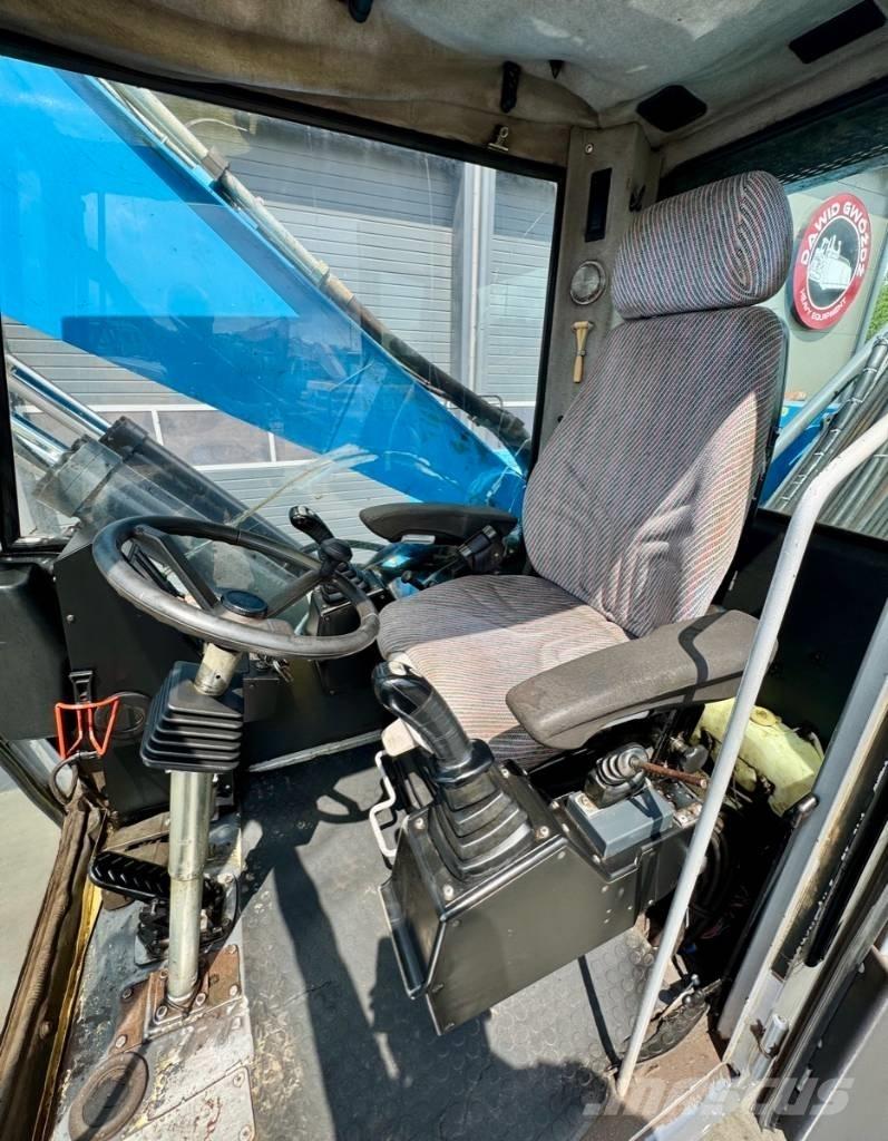 Fuchs MHL 331 폐기물/산업 처리기