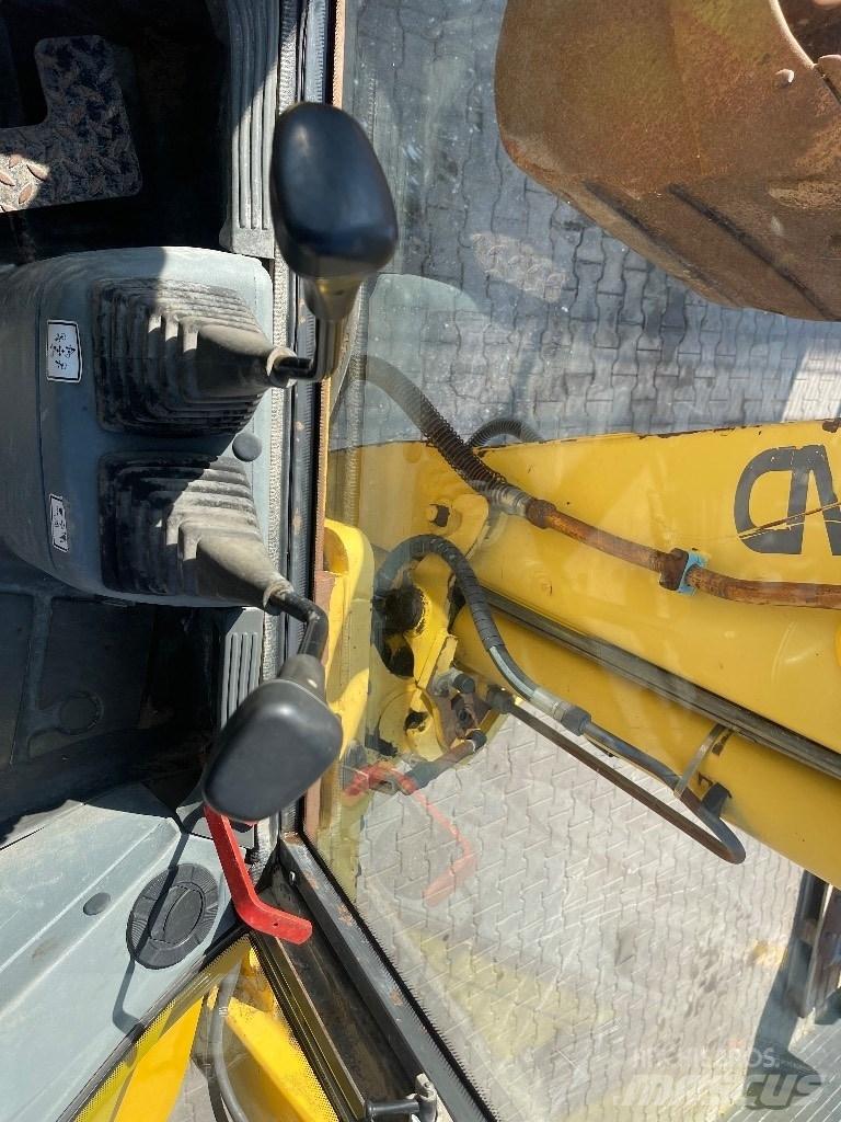 New Holland LB 110 백호로더