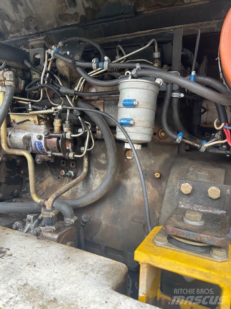Komatsu PW 95  휠 굴삭기