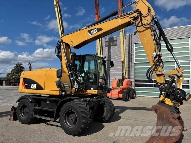 CAT M 313 D  휠 굴삭기