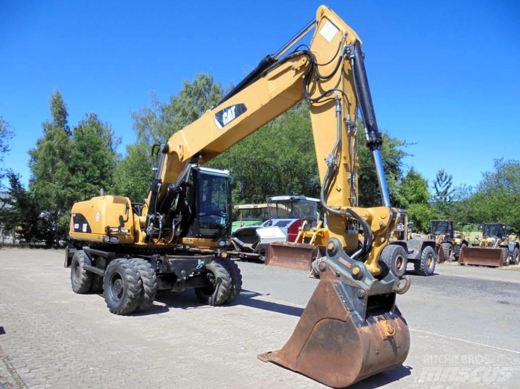 CAT M 322 D  휠 굴삭기