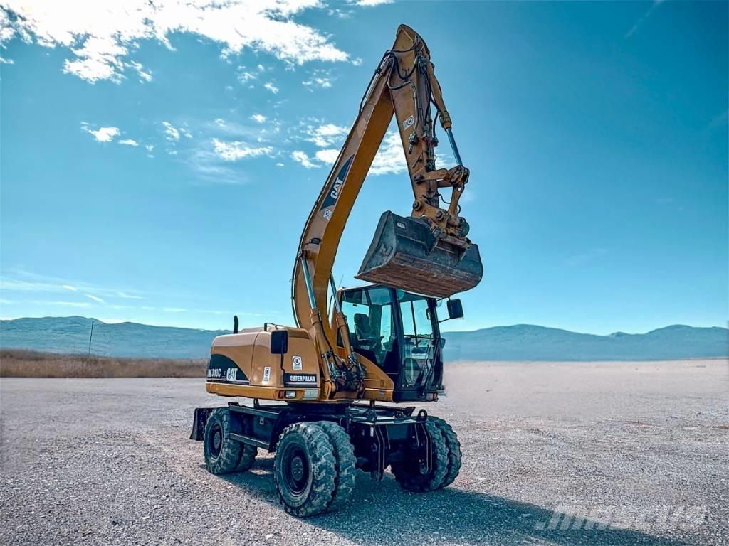 CAT M 313 C  휠 굴삭기