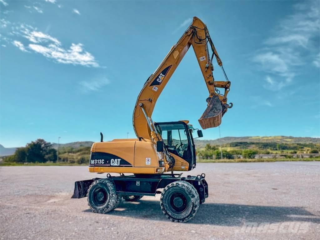 CAT M 313 C  휠 굴삭기