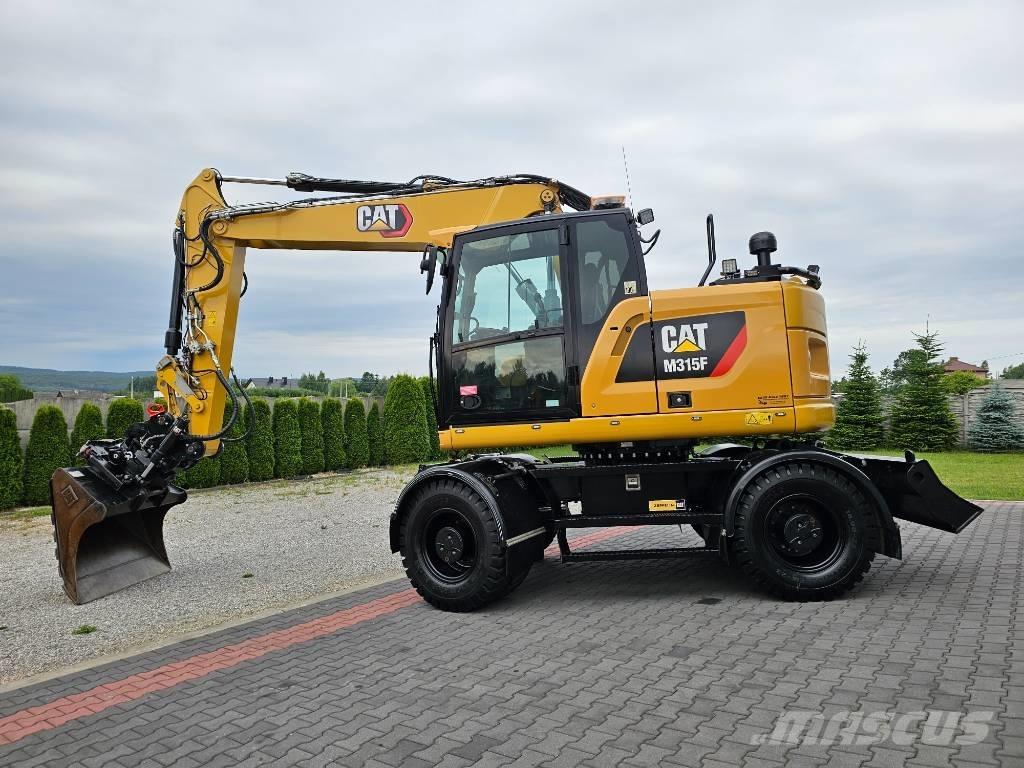 CAT M 315 F  휠 굴삭기