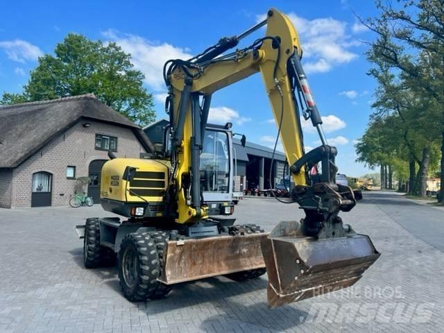 Neuson 9503  휠 굴삭기