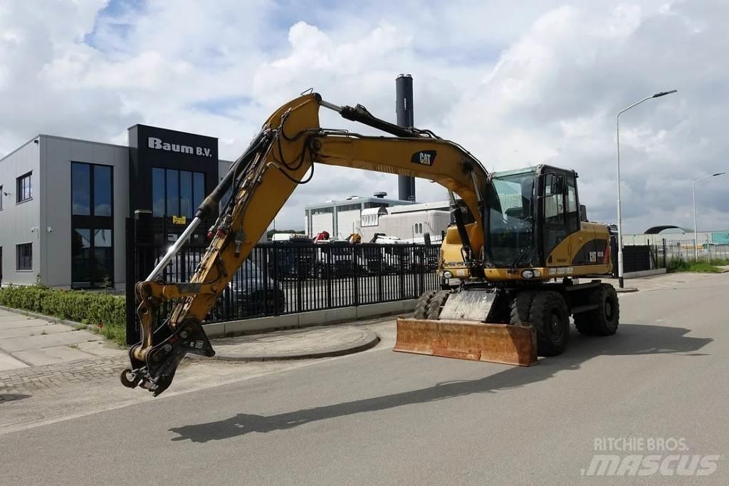 CAT M313 D  휠 굴삭기