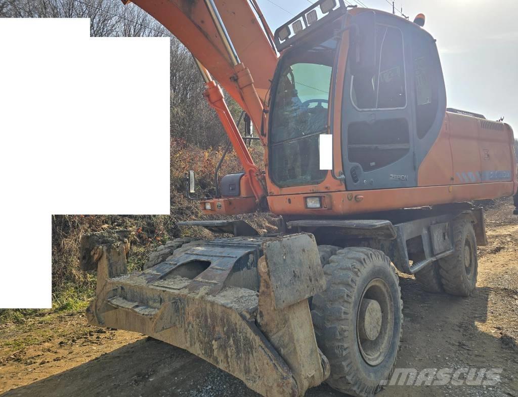 Doosan DX 210 W  휠 굴삭기