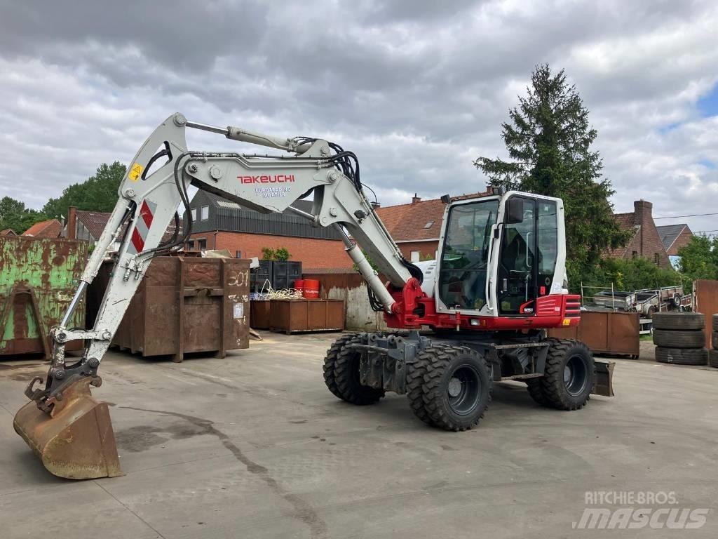 Takeuchi TB 295 W  휠 굴삭기