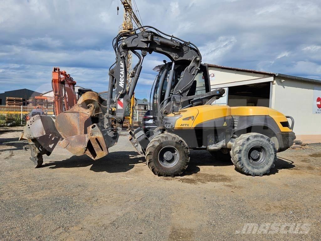 Mecalac 12 MTX  휠 굴삭기