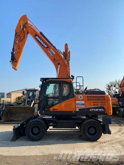 Doosan DX 210 W  휠 굴삭기