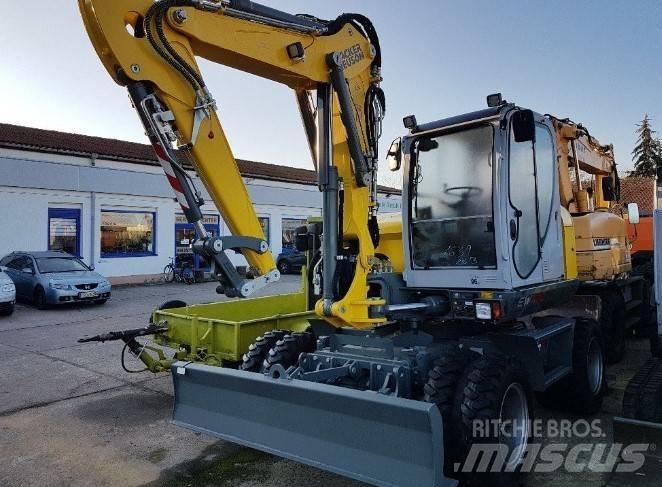 Neuson EW100 소형 굴삭기 7톤 미만