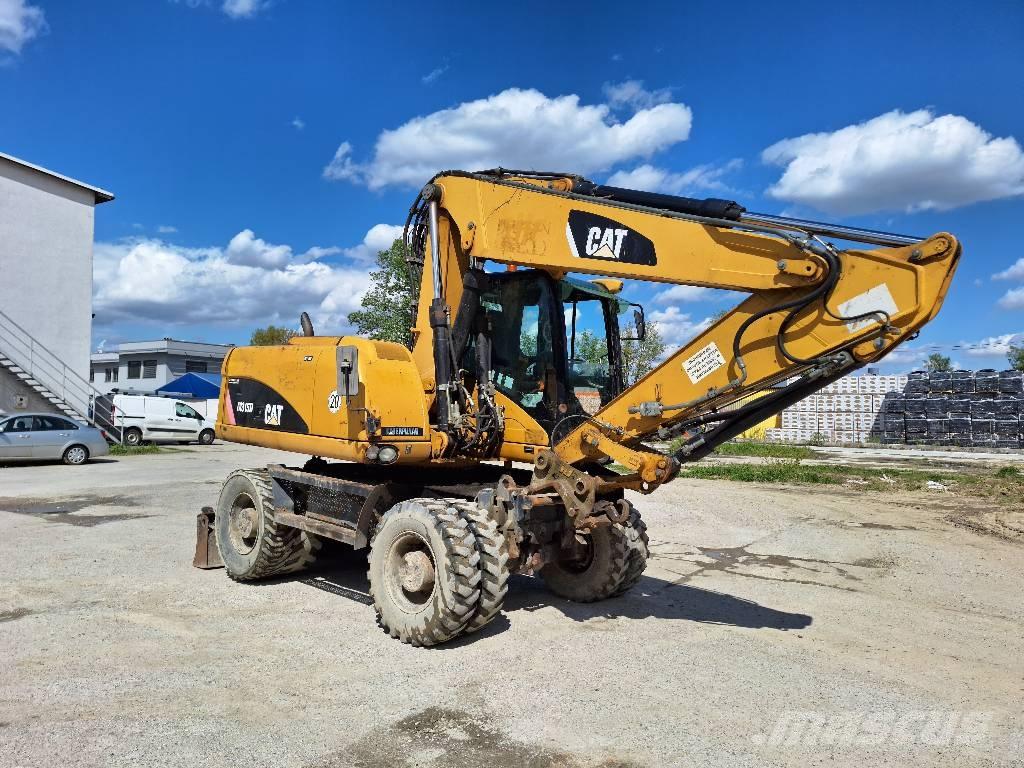CAT M 315 D  휠 굴삭기