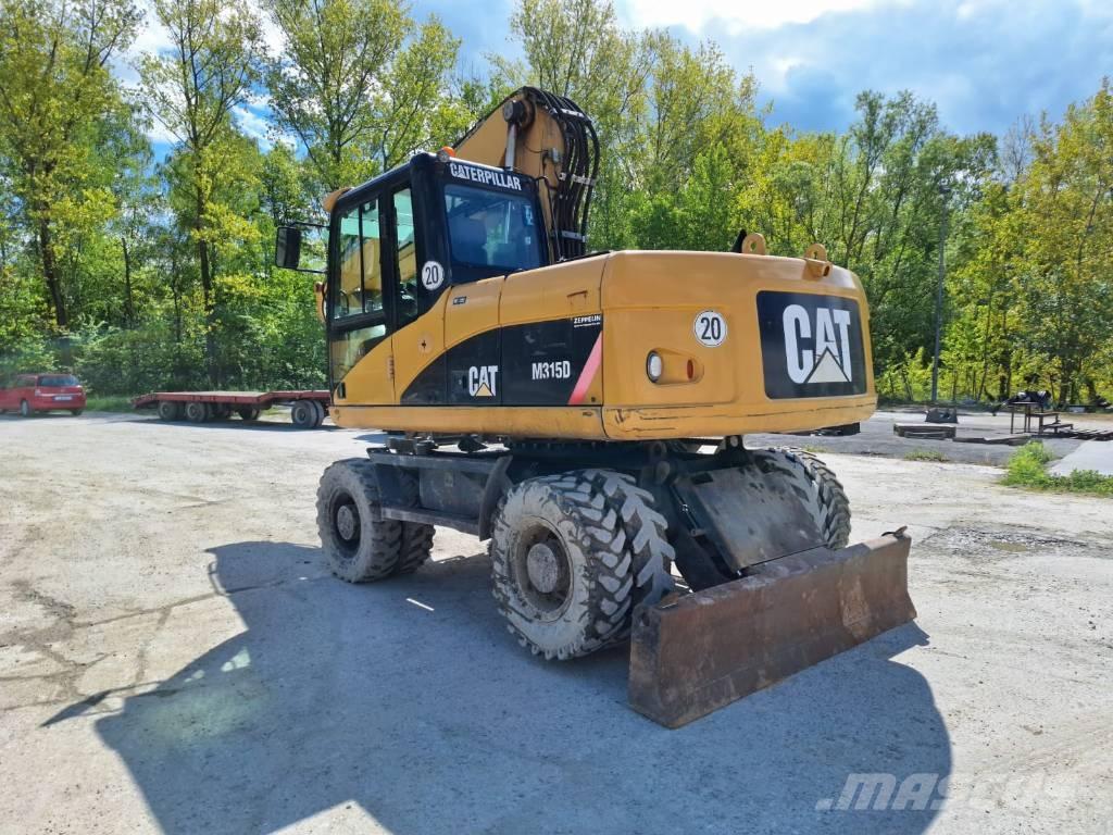 CAT M 315 D  휠 굴삭기