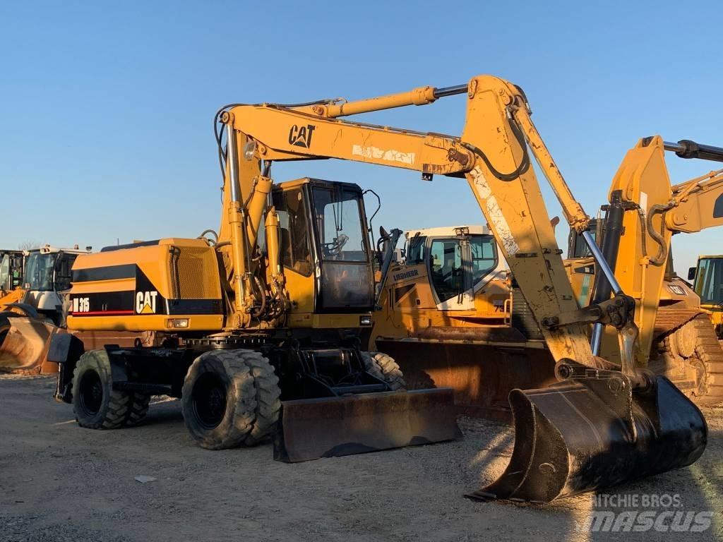 CAT M 315  휠 굴삭기