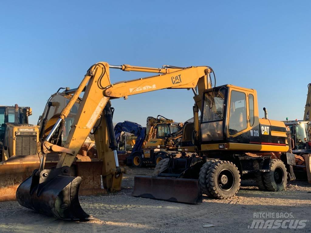 CAT M 315  휠 굴삭기