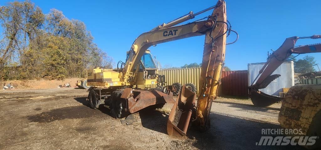 CAT 212  휠 굴삭기