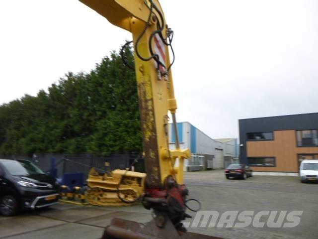 New Holland MH Plus  휠 굴삭기