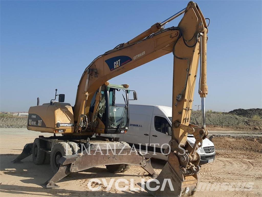 CAT M318  휠 굴삭기