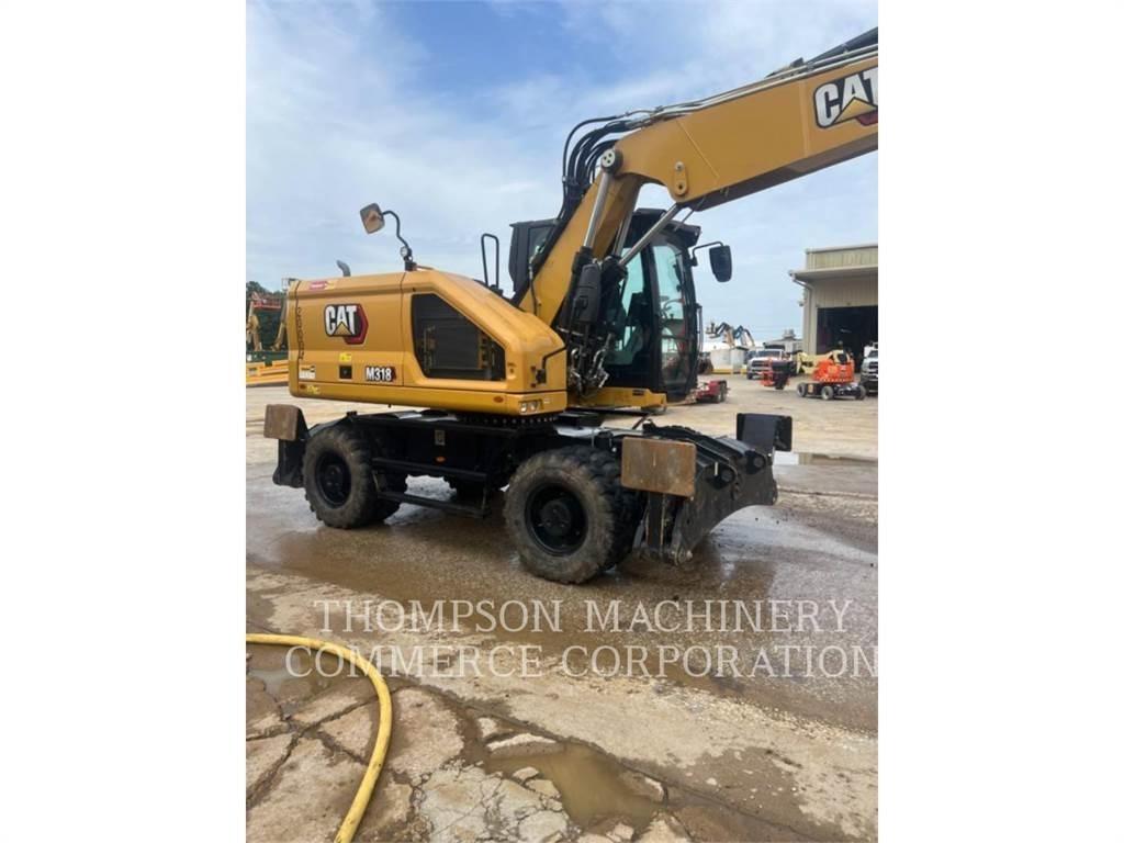 CAT M31807  휠 굴삭기