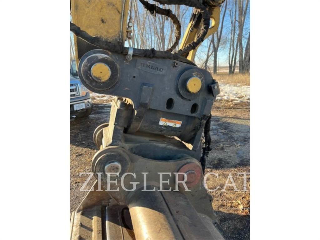 CAT M320F  휠 굴삭기