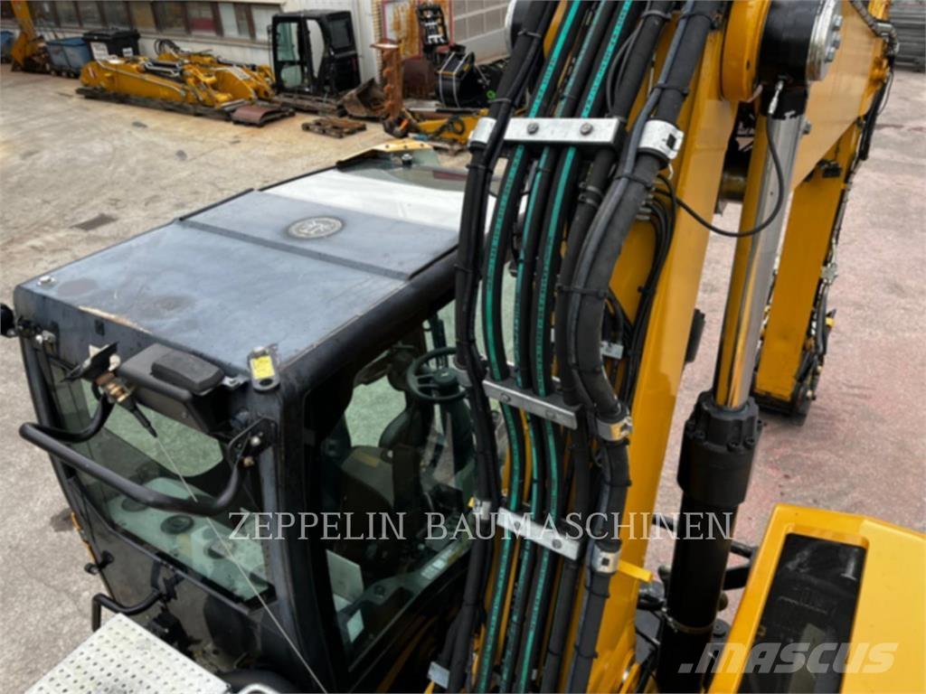 CAT M320F  휠 굴삭기