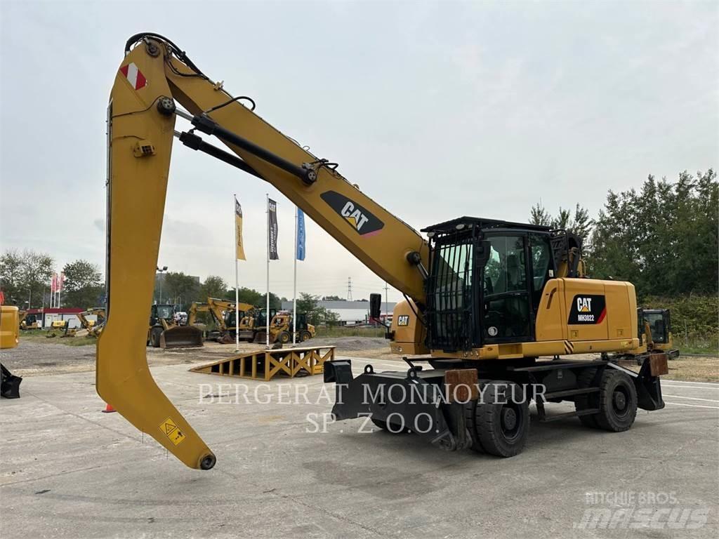 CAT MH3022  휠 굴삭기