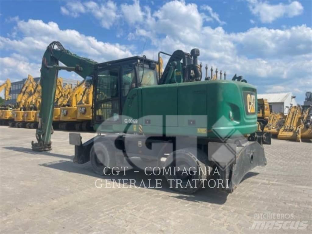 CAT MH3022  휠 굴삭기