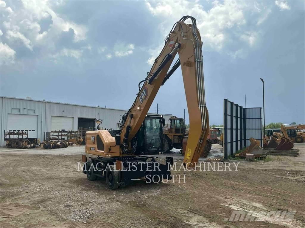 CAT MH3022  휠 굴삭기