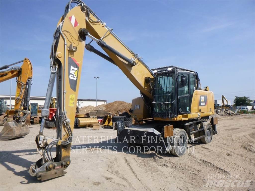 CAT MH3022-06  휠 굴삭기