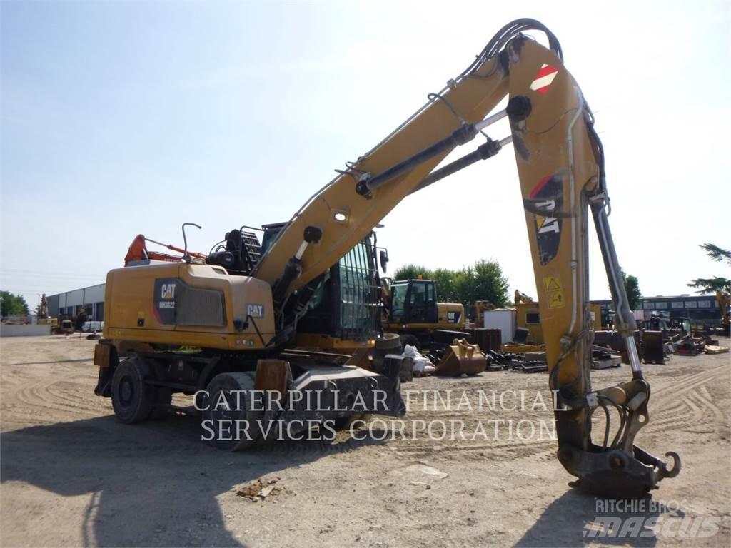 CAT MH3022-06  휠 굴삭기