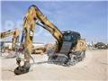 CAT MH3022-06  휠 굴삭기