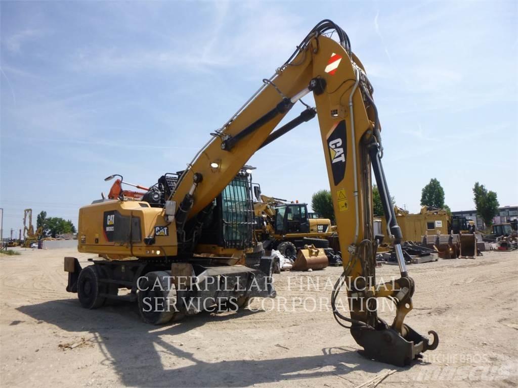 CAT MH3022-06  휠 굴삭기