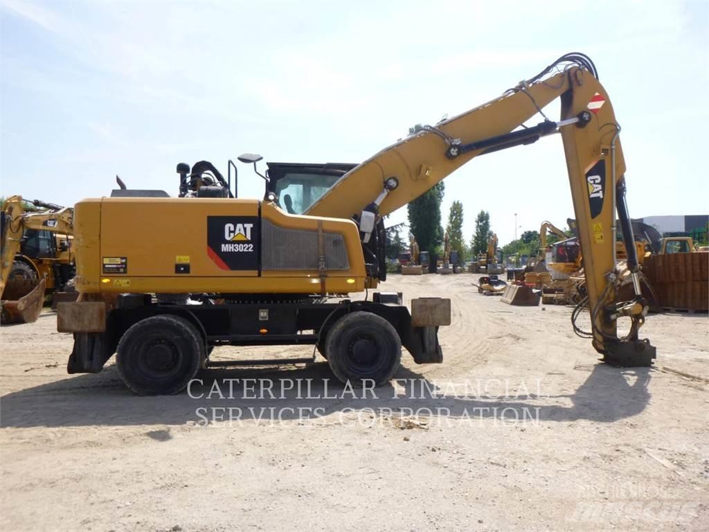 CAT MH3022-06  휠 굴삭기